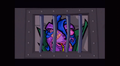 Dimitri behind bars.